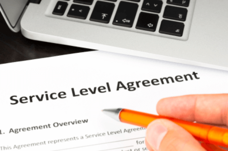 Professional reviewing a Service Level Agreement