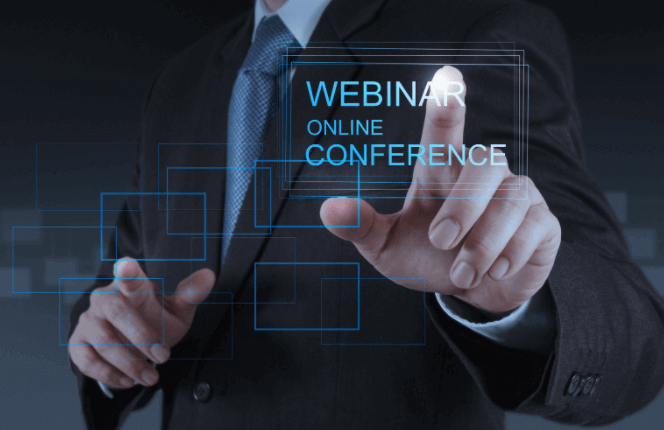 Business man behind a webinar graphic
