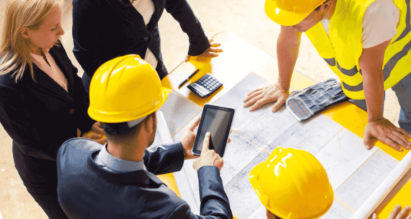 On-site workers using mobile software
